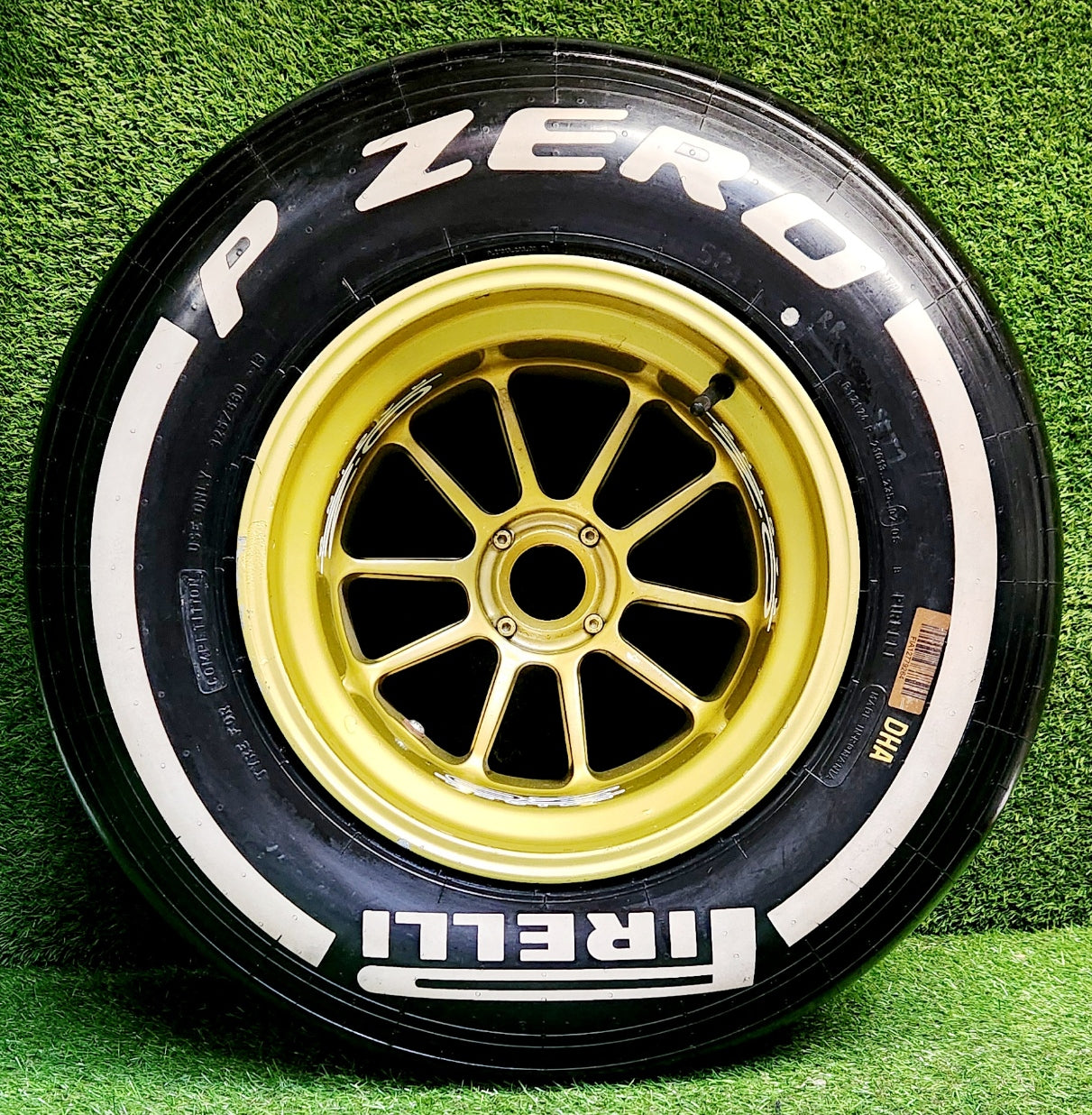 Genuine Pirelli F1 Racing Wheel & Slick Tyre. Race used by Kimi / Grosjean