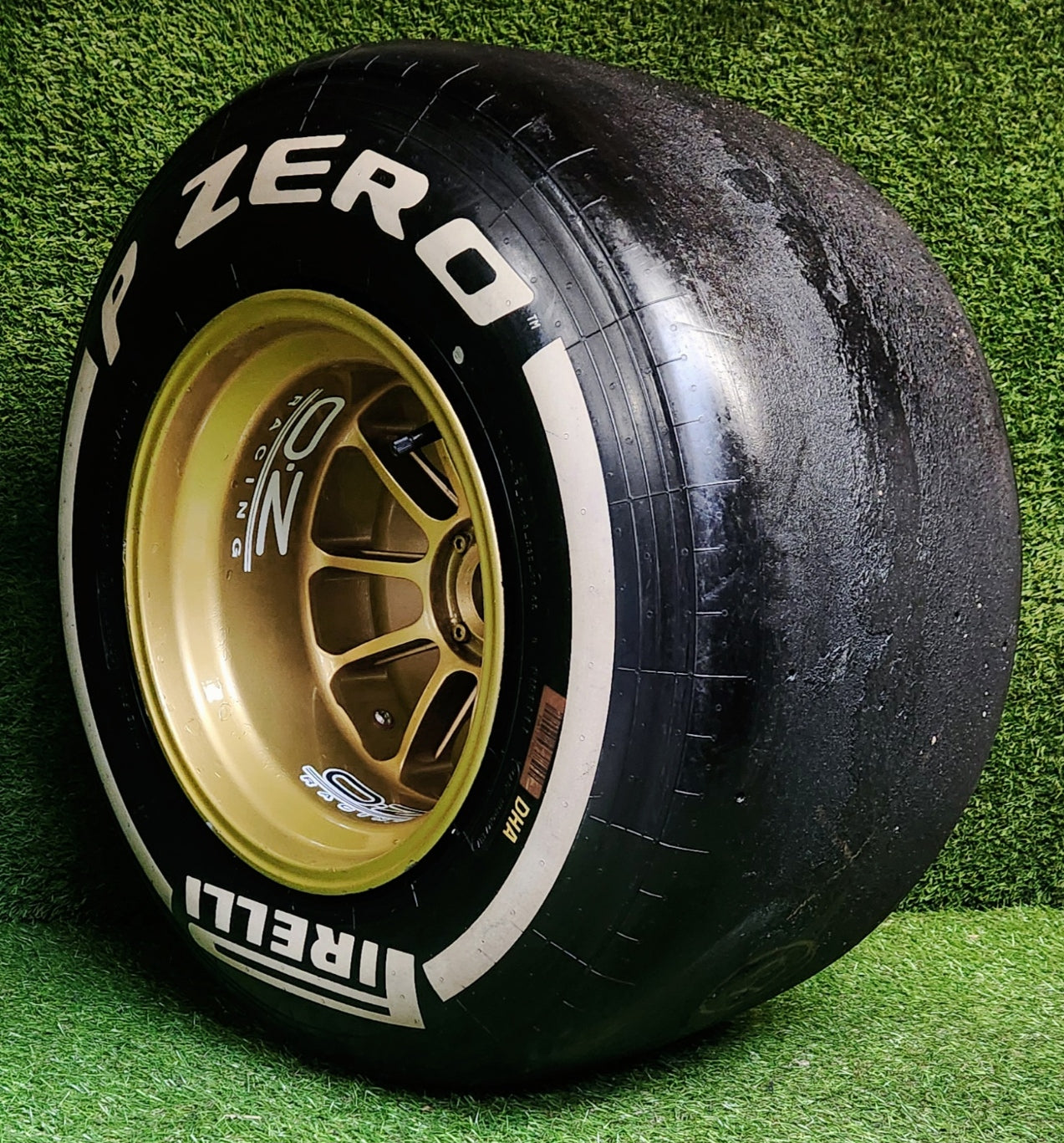 Genuine Pirelli F1 Racing Wheel & Slick Tyre. Race used by Kimi / Grosjean